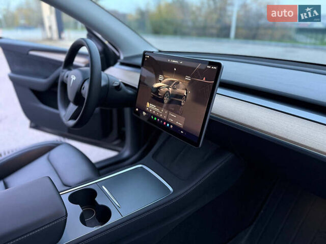 Черный Тесла Model Y, объемом двигателя 0 л и пробегом 53 тыс. км за 34999 $, фото 24 на Automoto.ua