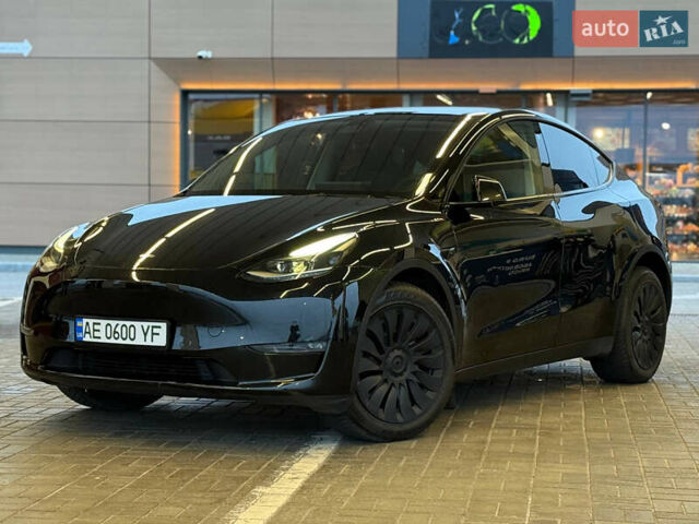Черный Тесла Model Y, объемом двигателя 0 л и пробегом 53 тыс. км за 34999 $, фото 1 на Automoto.ua