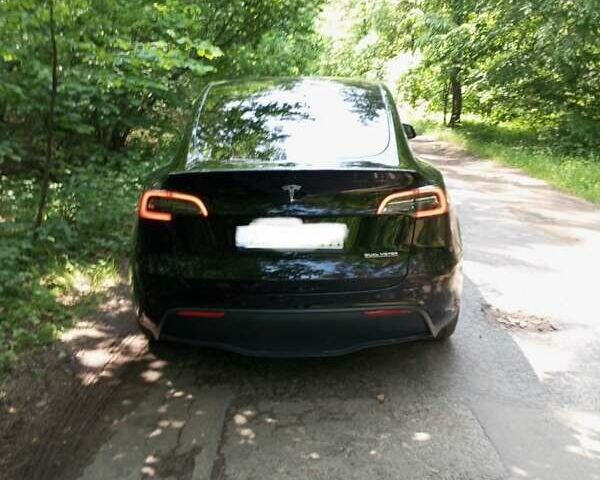 Черный Тесла Model Y, объемом двигателя 0 л и пробегом 90 тыс. км за 29000 $, фото 8 на Automoto.ua