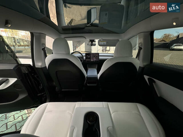 Черный Тесла Model Y, объемом двигателя 0 л и пробегом 136 тыс. км за 26199 $, фото 49 на Automoto.ua