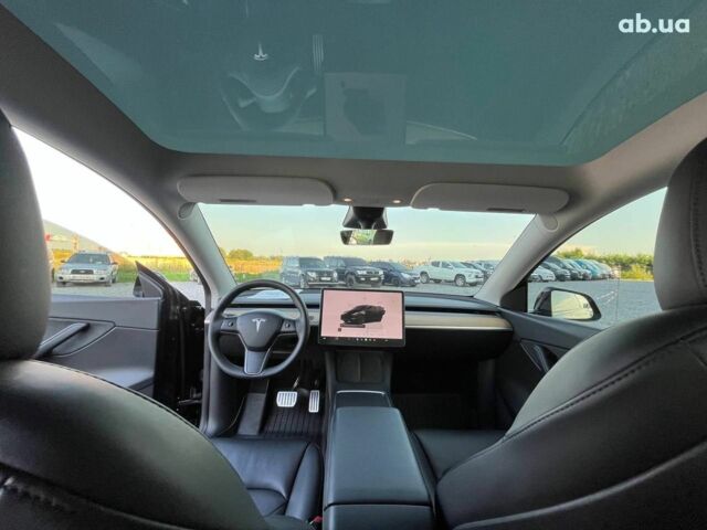 Черный Тесла Model Y, объемом двигателя 0 л и пробегом 73 тыс. км за 27890 $, фото 33 на Automoto.ua