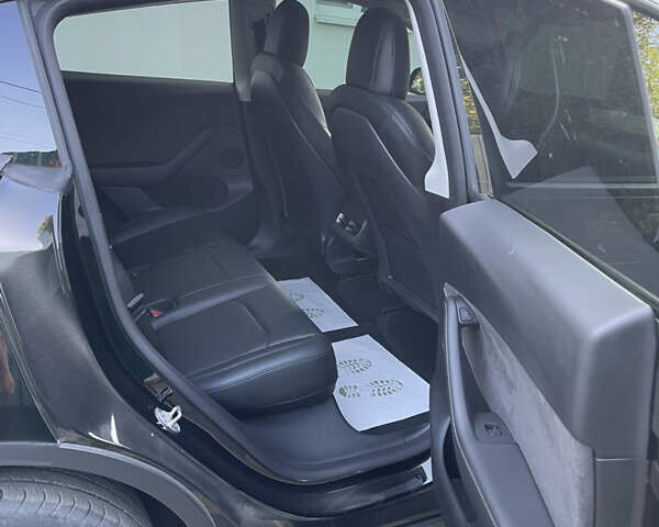 Черный Тесла Model Y, объемом двигателя 0 л и пробегом 67 тыс. км за 27500 $, фото 32 на Automoto.ua