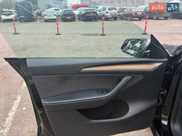 Черный Тесла Model Y, объемом двигателя 0 л и пробегом 35 тыс. км за 21300 $, фото 26 на Automoto.ua