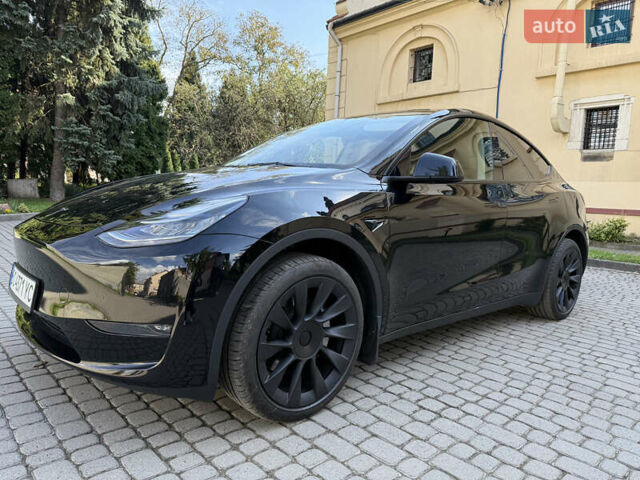 Черный Тесла Model Y, объемом двигателя 0 л и пробегом 58 тыс. км за 27500 $, фото 1 на Automoto.ua