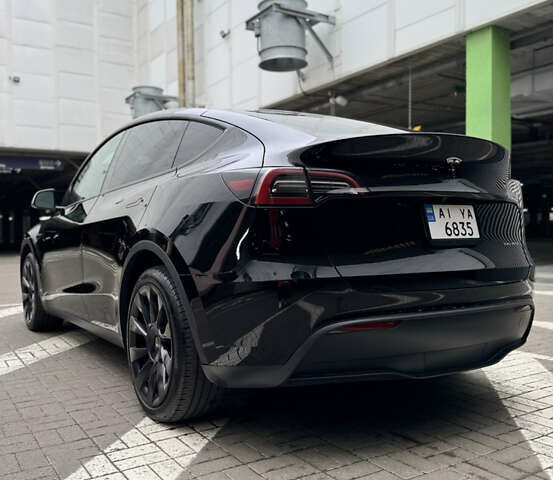 Черный Тесла Model Y, объемом двигателя 0 л и пробегом 28 тыс. км за 29000 $, фото 3 на Automoto.ua