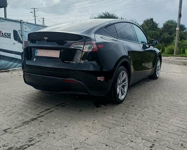 Черный Тесла Model Y, объемом двигателя 0 л и пробегом 60 тыс. км за 26400 $, фото 1 на Automoto.ua