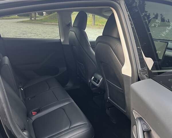 Черный Тесла Model Y, объемом двигателя 0 л и пробегом 64 тыс. км за 29100 $, фото 7 на Automoto.ua