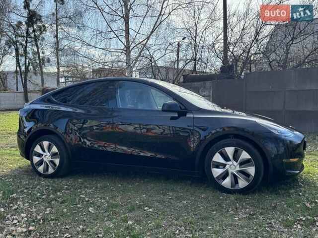 Черный Тесла Model Y, объемом двигателя 0 л и пробегом 30 тыс. км за 29000 $, фото 1 на Automoto.ua