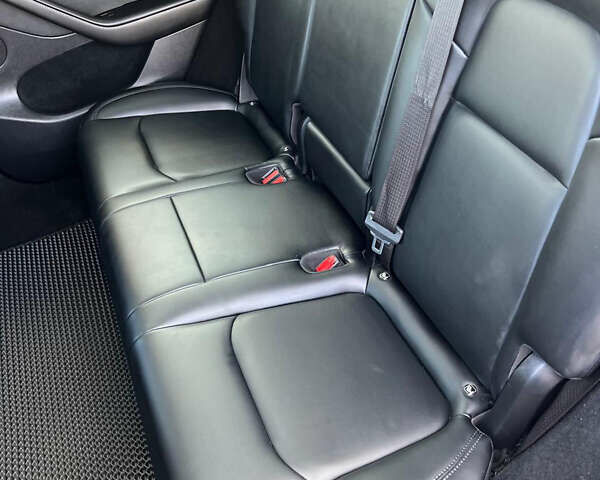 Черный Тесла Model Y, объемом двигателя 0 л и пробегом 22 тыс. км за 25500 $, фото 30 на Automoto.ua