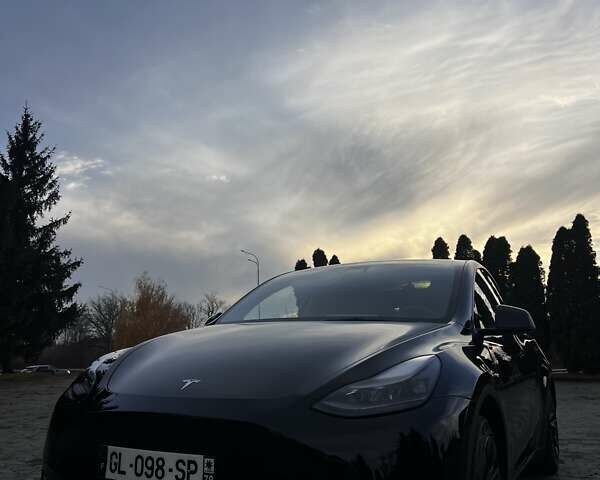 Черный Тесла Model Y, объемом двигателя 0 л и пробегом 64 тыс. км за 29100 $, фото 1 на Automoto.ua