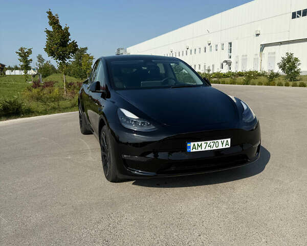 Черный Тесла Model Y, объемом двигателя 0 л и пробегом 22 тыс. км за 26500 $, фото 1 на Automoto.ua
