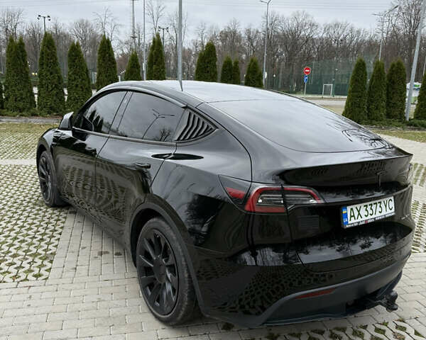 Черный Тесла Model Y, объемом двигателя 0 л и пробегом 80 тыс. км за 28000 $, фото 3 на Automoto.ua