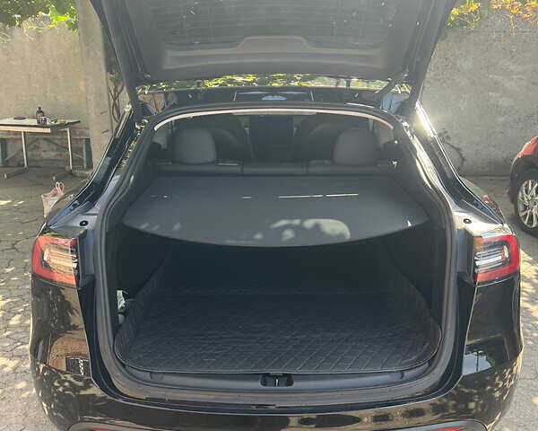 Черный Тесла Model Y, объемом двигателя 0 л и пробегом 54 тыс. км за 26900 $, фото 16 на Automoto.ua
