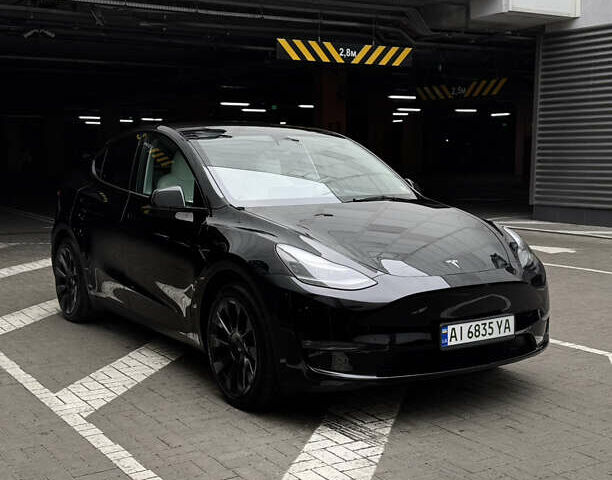 Черный Тесла Model Y, объемом двигателя 0 л и пробегом 28 тыс. км за 29000 $, фото 1 на Automoto.ua