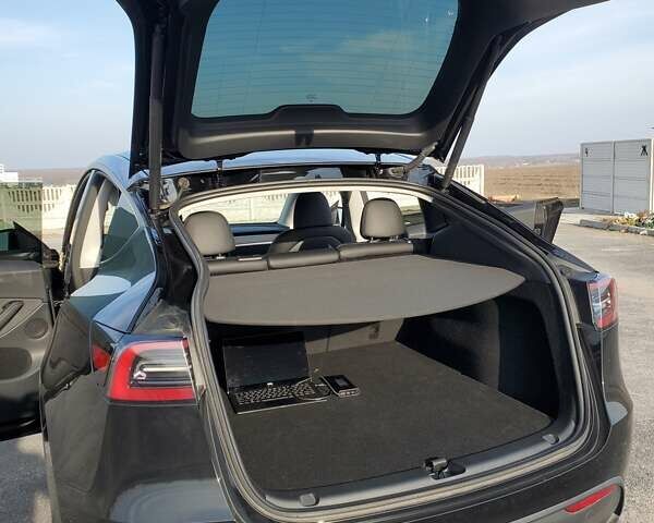 Чорний Тесла Model Y, об'ємом двигуна 0 л та пробігом 12 тис. км за 23300 $, фото 26 на Automoto.ua