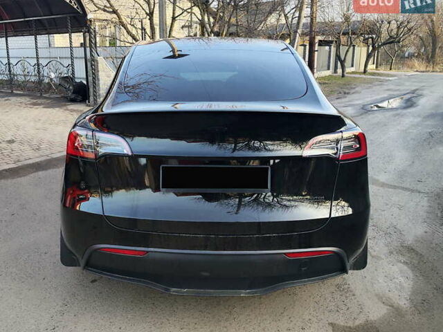 Черный Тесла Model Y, объемом двигателя 0 л и пробегом 19 тыс. км за 30900 $, фото 5 на Automoto.ua