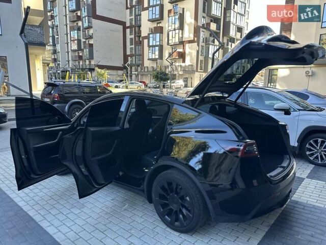 Черный Тесла Model Y, объемом двигателя 0 л и пробегом 65 тыс. км за 25555 $, фото 11 на Automoto.ua