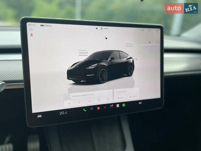 Черный Тесла Model Y, объемом двигателя 0 л и пробегом 39 тыс. км за 31000 $, фото 22 на Automoto.ua