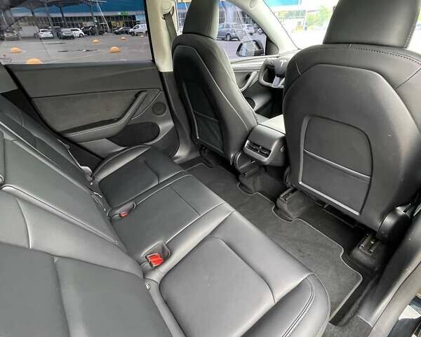 Черный Тесла Model Y, объемом двигателя 0 л и пробегом 53 тыс. км за 29500 $, фото 14 на Automoto.ua