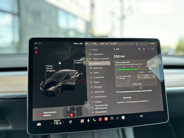 Черный Тесла Model Y, объемом двигателя 0 л и пробегом 2 тыс. км за 40990 $, фото 38 на Automoto.ua