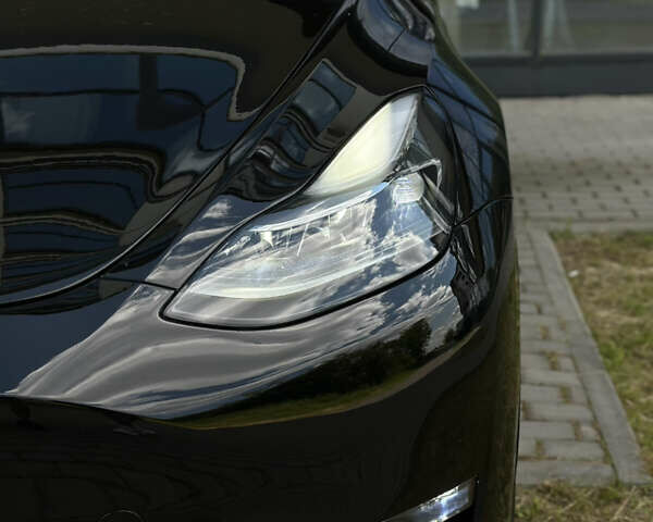 Черный Тесла Model Y, объемом двигателя 0 л и пробегом 13 тыс. км за 28999 $, фото 4 на Automoto.ua