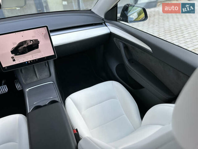 Черный Тесла Model Y, объемом двигателя 0 л и пробегом 13 тыс. км за 28999 $, фото 15 на Automoto.ua