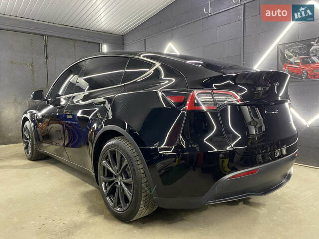 Черный Тесла Model Y, объемом двигателя 0 л и пробегом 71 тыс. км за 29000 $, фото 5 на Automoto.ua