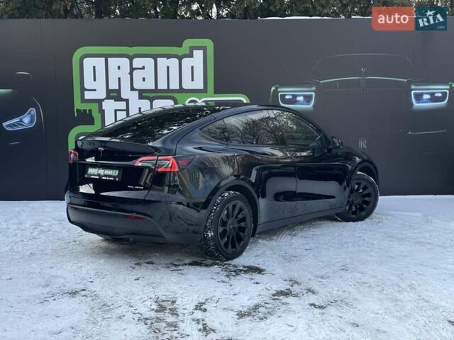 Черный Тесла Model Y, объемом двигателя 0 л и пробегом 1 тыс. км за 34900 $, фото 41 на Automoto.ua