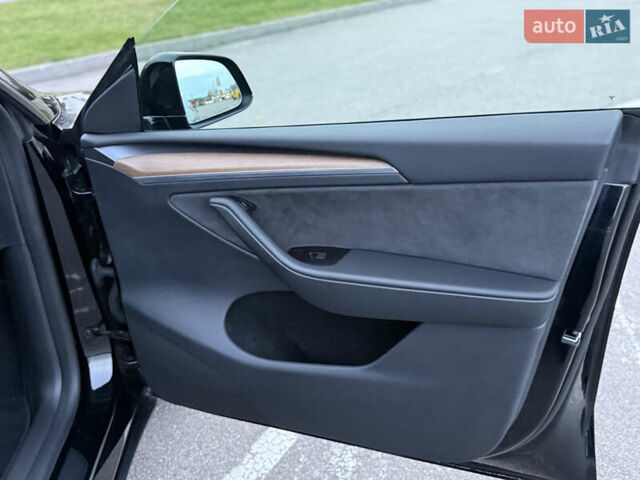 Черный Тесла Model Y, объемом двигателя 0 л и пробегом 67 тыс. км за 33490 $, фото 29 на Automoto.ua