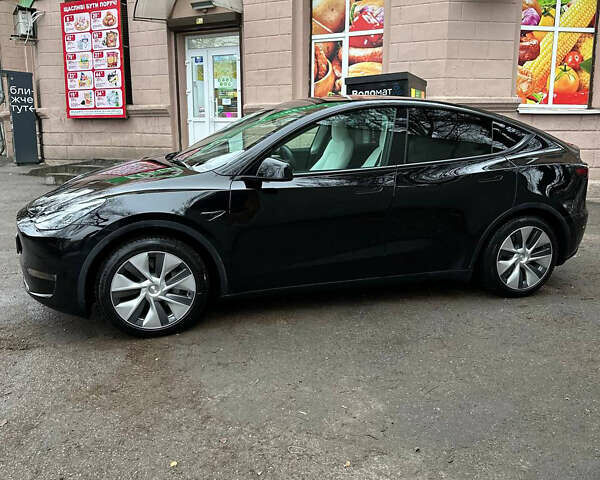 Черный Тесла Model Y, объемом двигателя 0 л и пробегом 98 тыс. км за 27000 $, фото 2 на Automoto.ua