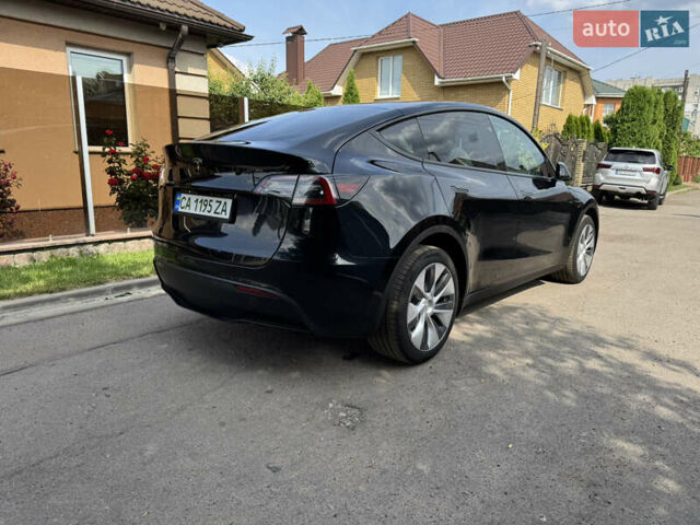 Черный Тесла Model Y, объемом двигателя 0 л и пробегом 28 тыс. км за 31500 $, фото 2 на Automoto.ua