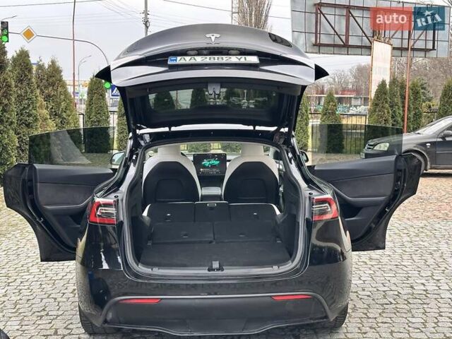 Чорний Тесла Model Y, об'ємом двигуна 0 л та пробігом 99 тис. км за 22999 $, фото 26 на Automoto.ua