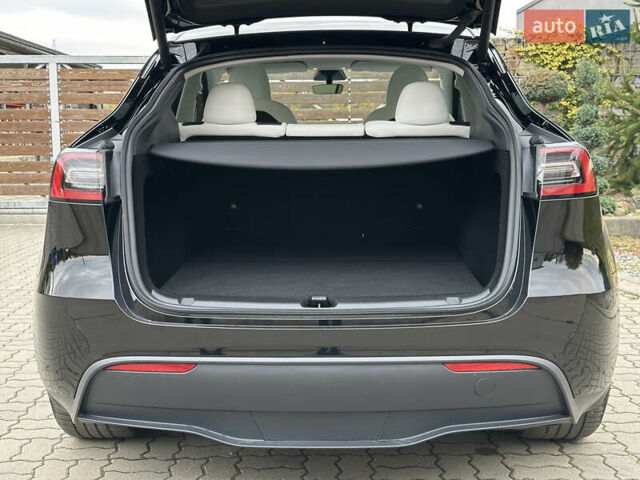 Чорний Тесла Model Y, об'ємом двигуна 0 л та пробігом 38 тис. км за 30799 $, фото 77 на Automoto.ua