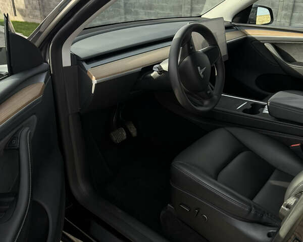 Чорний Тесла Model Y, об'ємом двигуна 0 л та пробігом 55 тис. км за 28100 $, фото 16 на Automoto.ua