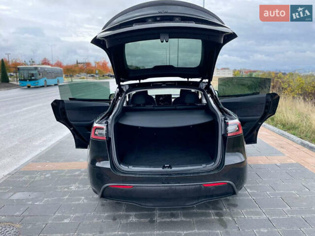 Черный Тесла Model Y, объемом двигателя 0 л и пробегом 16 тыс. км за 29200 $, фото 14 на Automoto.ua