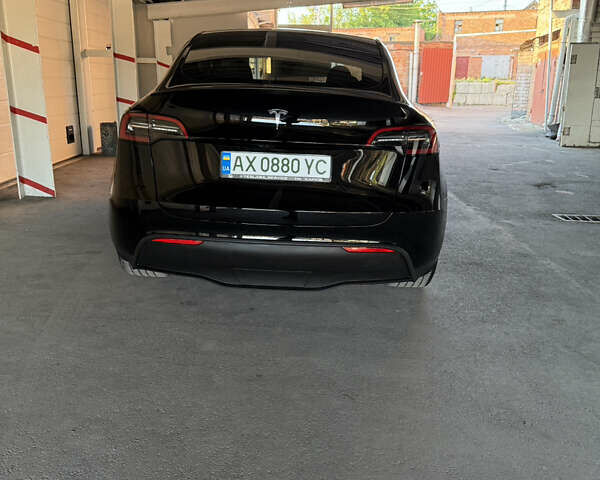 Черный Тесла Model Y, объемом двигателя 0 л и пробегом 28 тыс. км за 35700 $, фото 2 на Automoto.ua