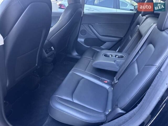Черный Тесла Model Y, объемом двигателя 0 л и пробегом 65 тыс. км за 25555 $, фото 19 на Automoto.ua