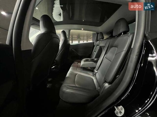 Черный Тесла Model Y, объемом двигателя 0 л и пробегом 5 тыс. км за 32000 $, фото 28 на Automoto.ua