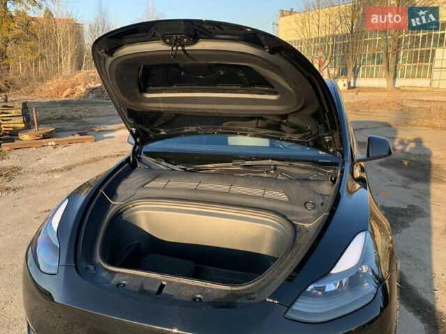 Черный Тесла Model Y, объемом двигателя 0 л и пробегом 25 тыс. км за 26500 $, фото 30 на Automoto.ua
