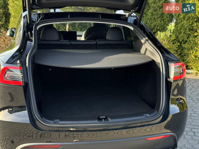Чорний Тесла Model Y, об'ємом двигуна 0 л та пробігом 39 тис. км за 28500 $, фото 28 на Automoto.ua