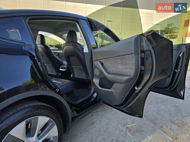 Чорний Тесла Model Y, об'ємом двигуна 0 л та пробігом 95 тис. км за 27300 $, фото 28 на Automoto.ua