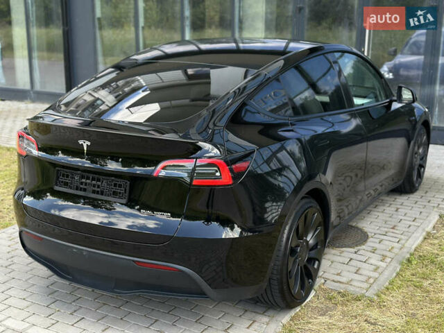 Черный Тесла Model Y, объемом двигателя 0 л и пробегом 13 тыс. км за 28999 $, фото 6 на Automoto.ua