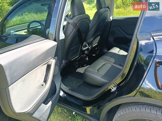 Черный Тесла Model Y, объемом двигателя 0 л и пробегом 1 тыс. км за 27500 $, фото 9 на Automoto.ua