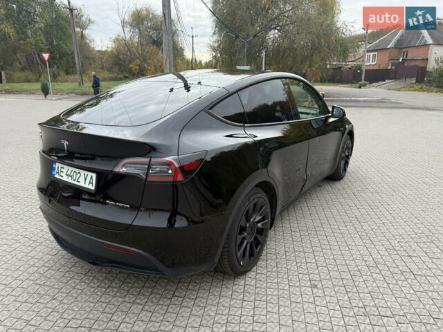 Черный Тесла Model Y, объемом двигателя 0 л и пробегом 71 тыс. км за 27000 $, фото 4 на Automoto.ua