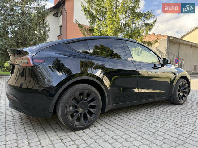 Черный Тесла Model Y, объемом двигателя 0 л и пробегом 58 тыс. км за 27500 $, фото 2 на Automoto.ua