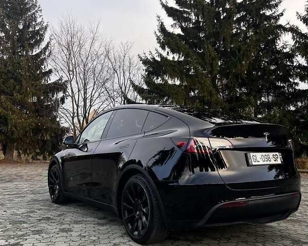 Черный Тесла Model Y, объемом двигателя 0 л и пробегом 64 тыс. км за 29100 $, фото 2 на Automoto.ua