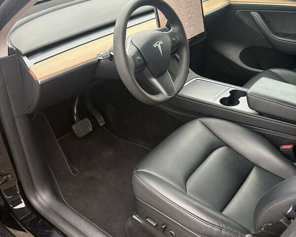 Черный Тесла Model Y, объемом двигателя 0 л и пробегом 35 тыс. км за 21900 $, фото 19 на Automoto.ua