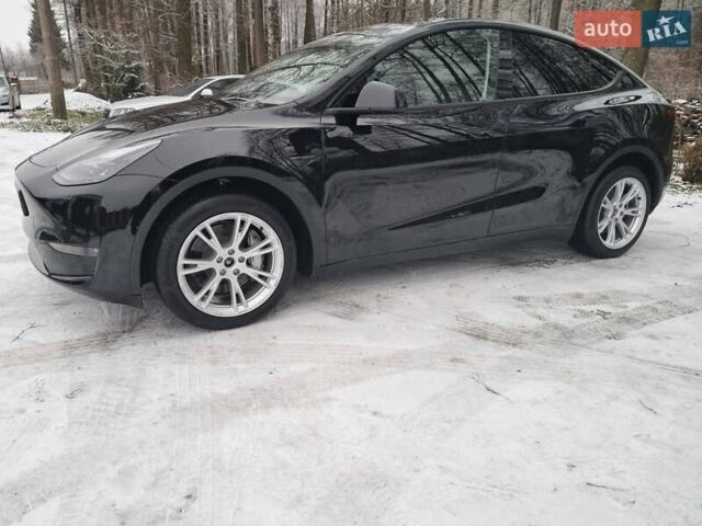 Черный Тесла Model Y, объемом двигателя 0 л и пробегом 32 тыс. км за 32000 $, фото 2 на Automoto.ua