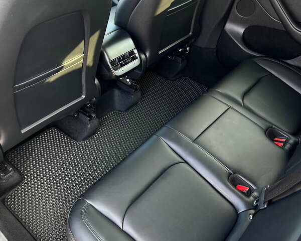 Черный Тесла Model Y, объемом двигателя 0 л и пробегом 22 тыс. км за 25500 $, фото 21 на Automoto.ua