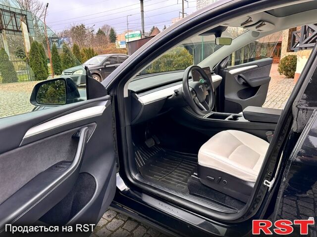 Чорний Тесла Model Y, об'ємом двигуна 0 л та пробігом 99 тис. км за 22999 $, фото 5 на Automoto.ua